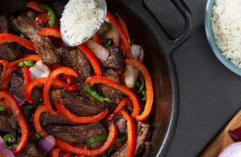 Mexican Beef Stir Fry with pepper over rice