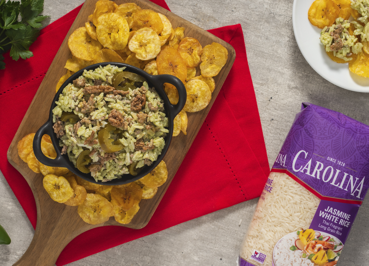 spicy-rice-dip-with-beef-and-chimichurri-sauce-served-with-plantain-chips