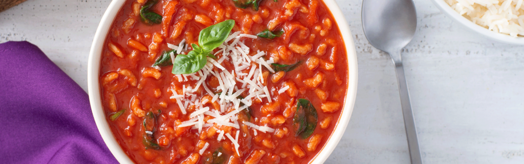 Tomato Rice Soup with cheese and basil