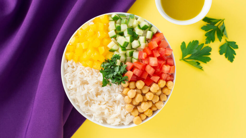 Rice and Chickpea Salad with Yellow Bell Pepper, Cucumbers and Tomatoes