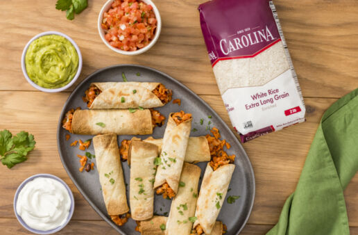 vegetarian-taquitos-with-black-beans-and-rice-served-with-guacamole-and-pico-de-gallo